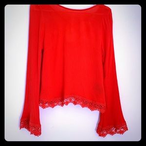 Blouse with bell sleeves